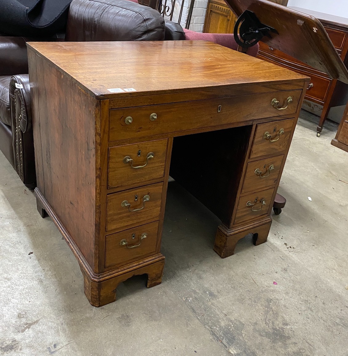 A George III mahogany kneehole desk, width ,depth 65cm, height 79cm